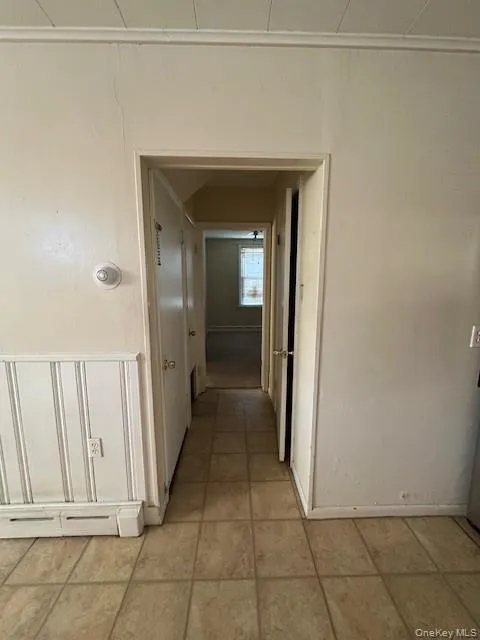 Hallway with baseboard heating Hallway with baseboard heating