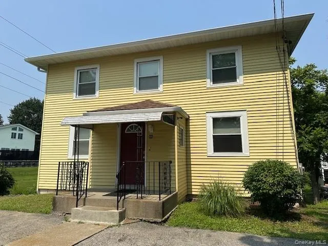 View of front facade featuring a porch View of front facade featuring a porch