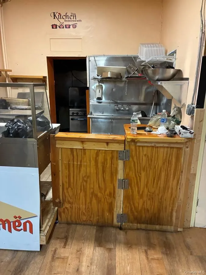 Kitchen with brown cabinetry Kitchen with brown cabinetry