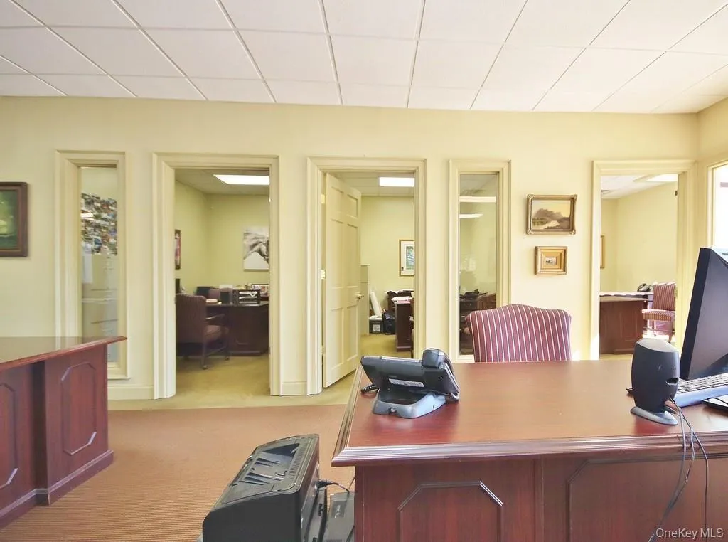Office area with light carpet Office area with light carpet