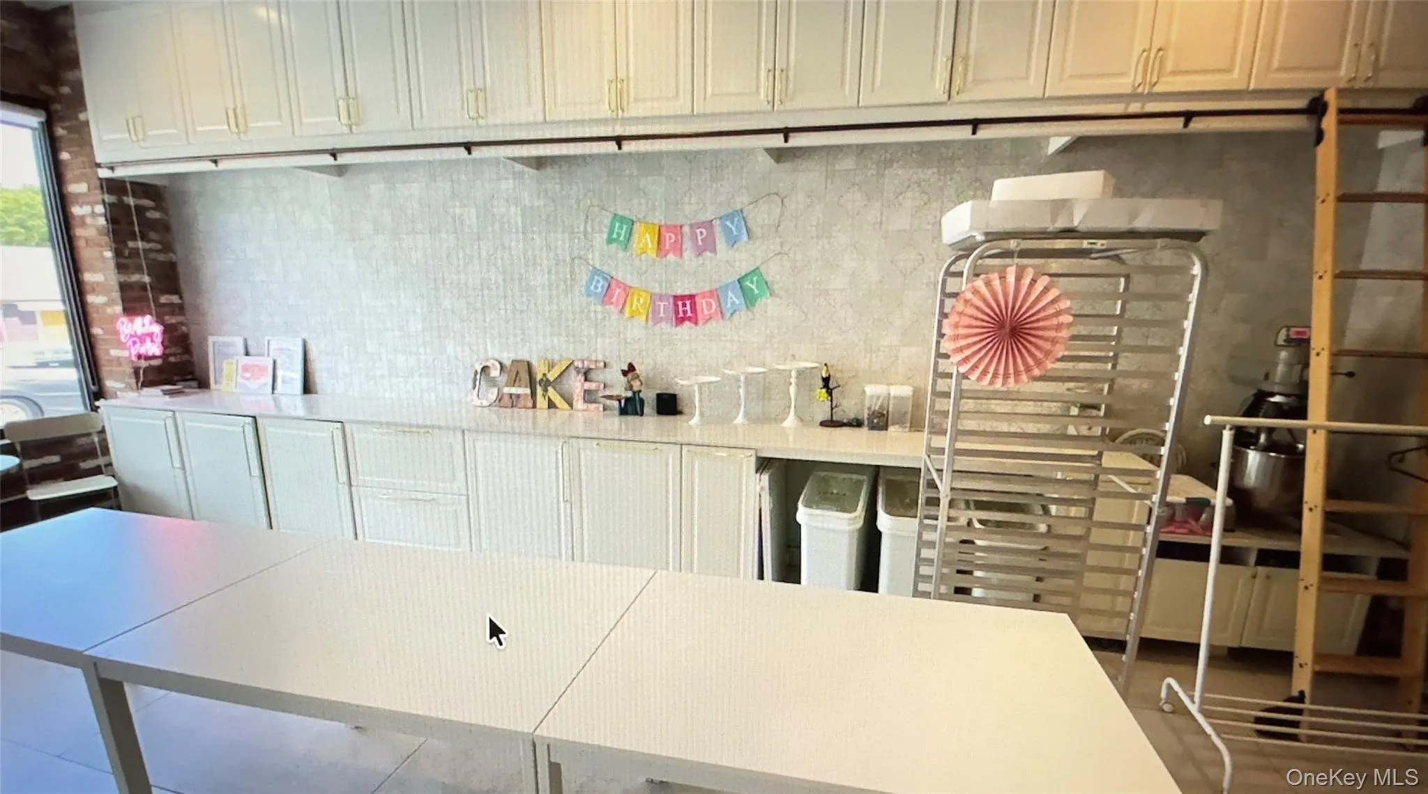 Kitchen featuring white cabinets Kitchen featuring white cabinets