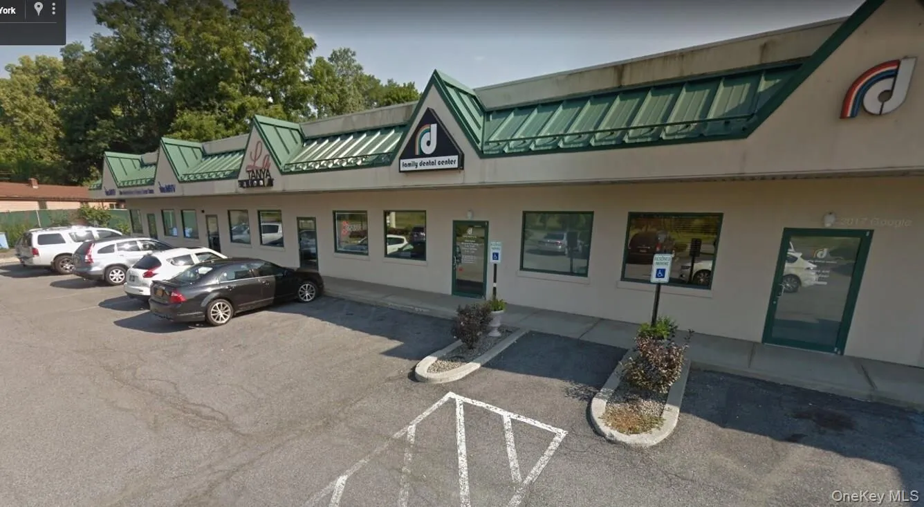 View of commercial location with uncovered parking View of commercial location with uncovered parking