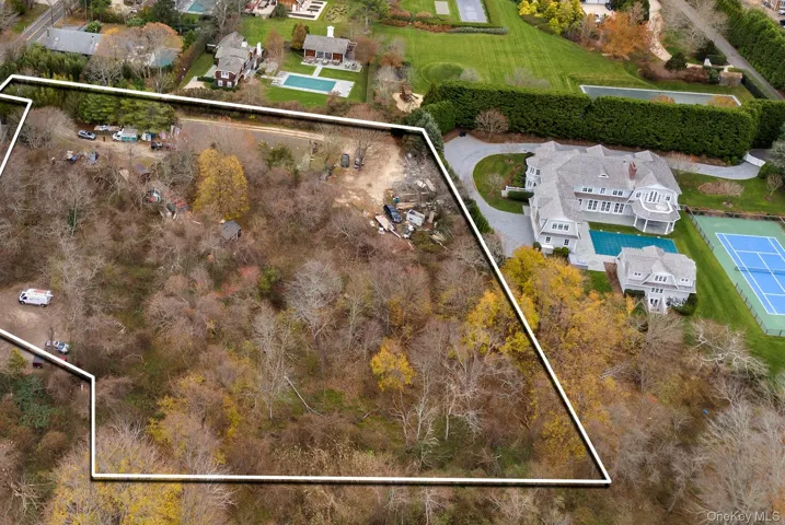 Aerial overview of property's location featuring property parcel outlined
