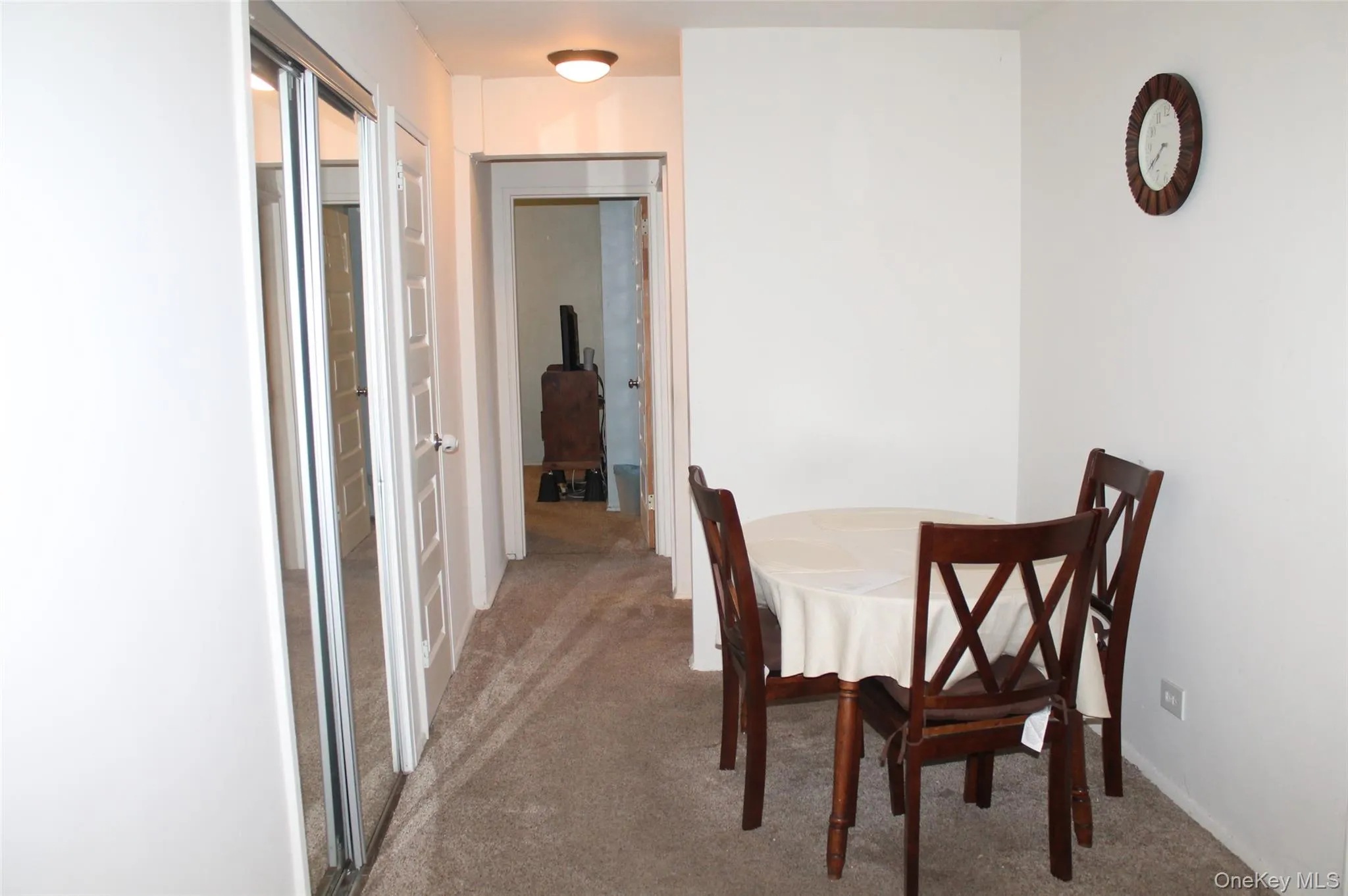 Dining area featuring light colored carpet Dining area featuring light colored carpet