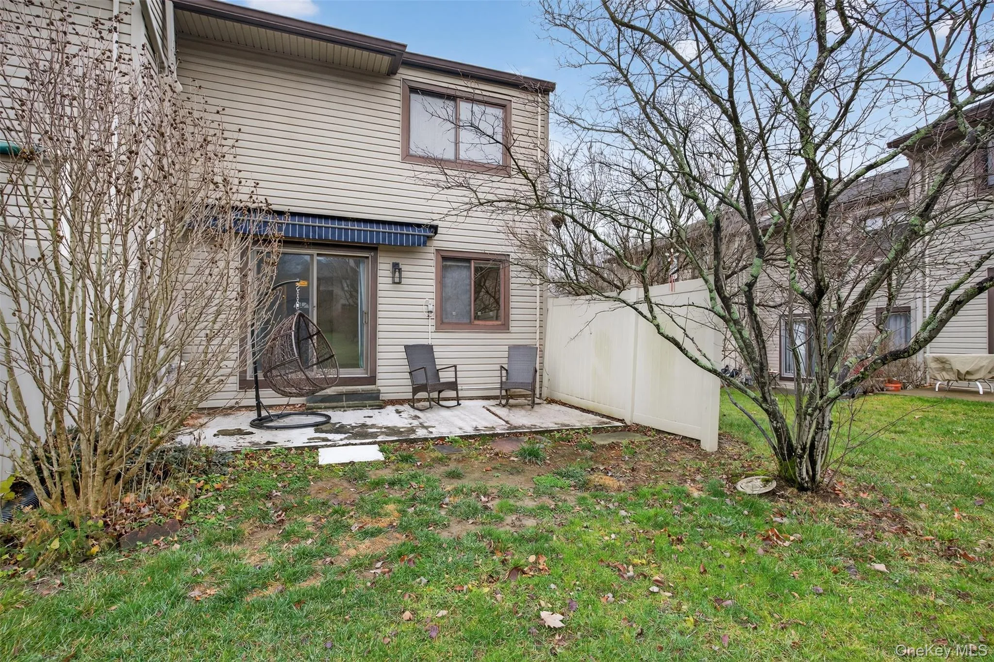 Rear view of property with a patio area Rear view of property with a patio area