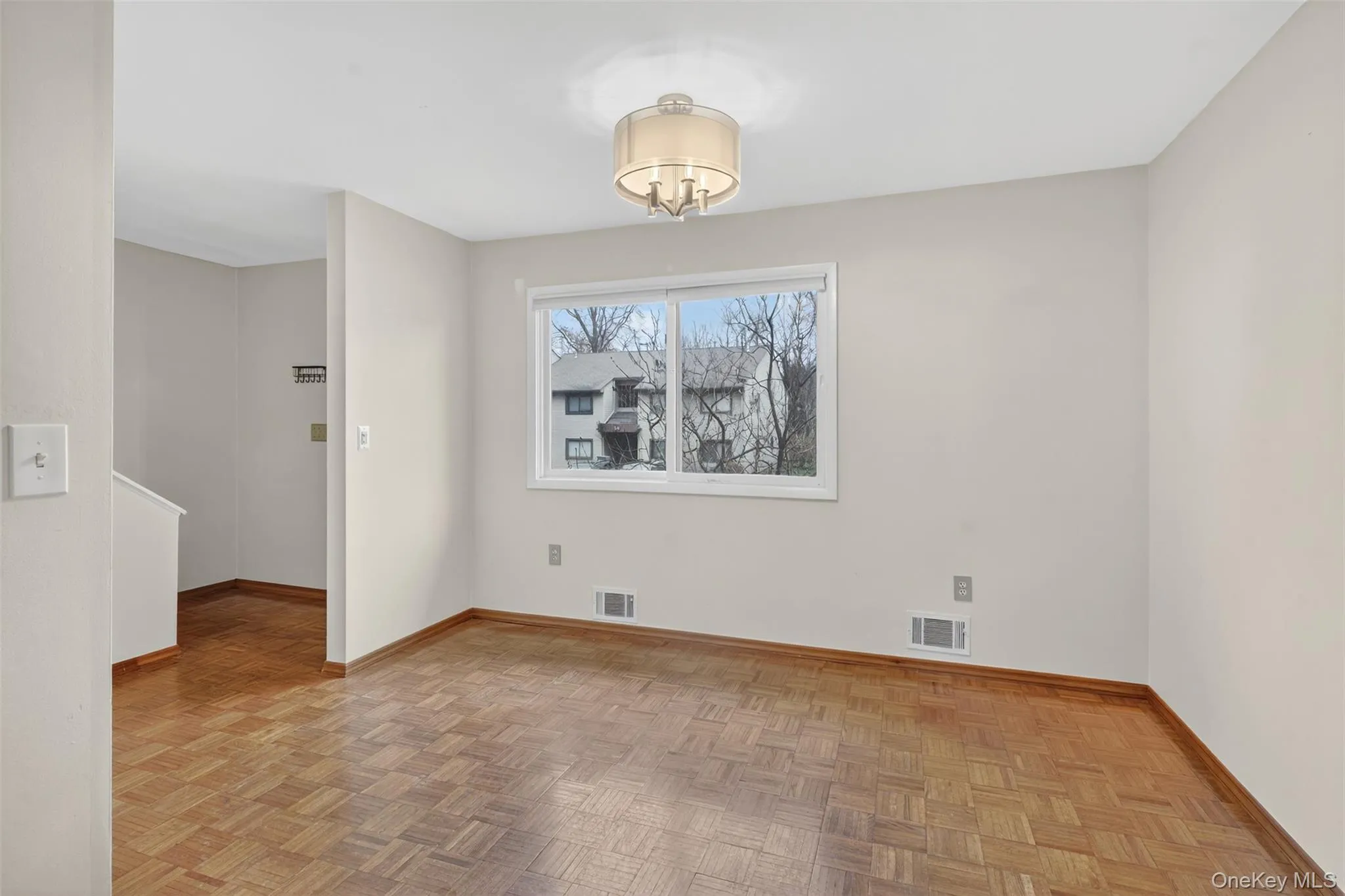 Unfurnished dining area featuring baseboards Unfurnished dining area featuring baseboards