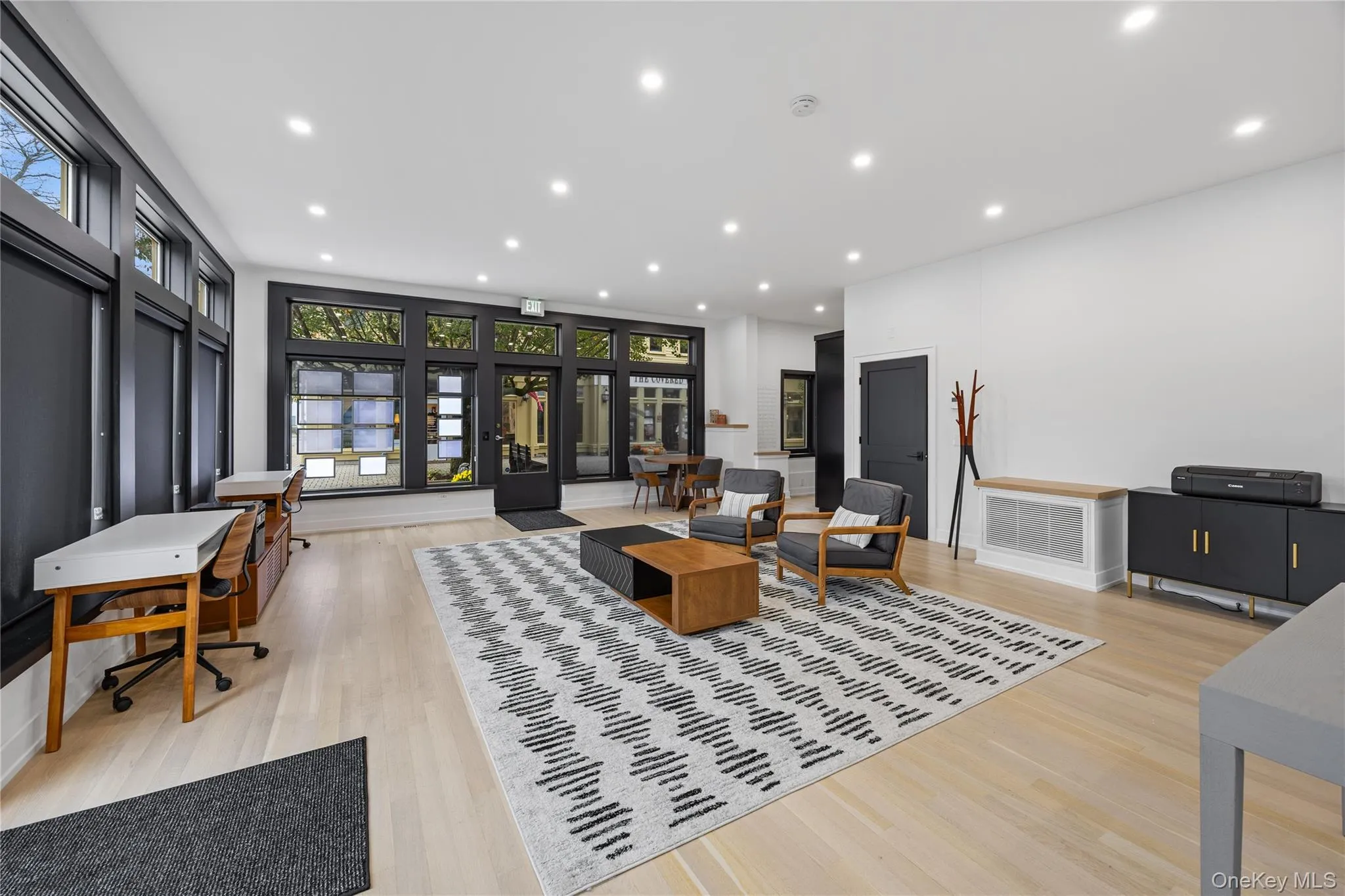 Living room featuring recessed lighting and light wood finished floors Living room featuring recessed lighting and light wood finished floors
