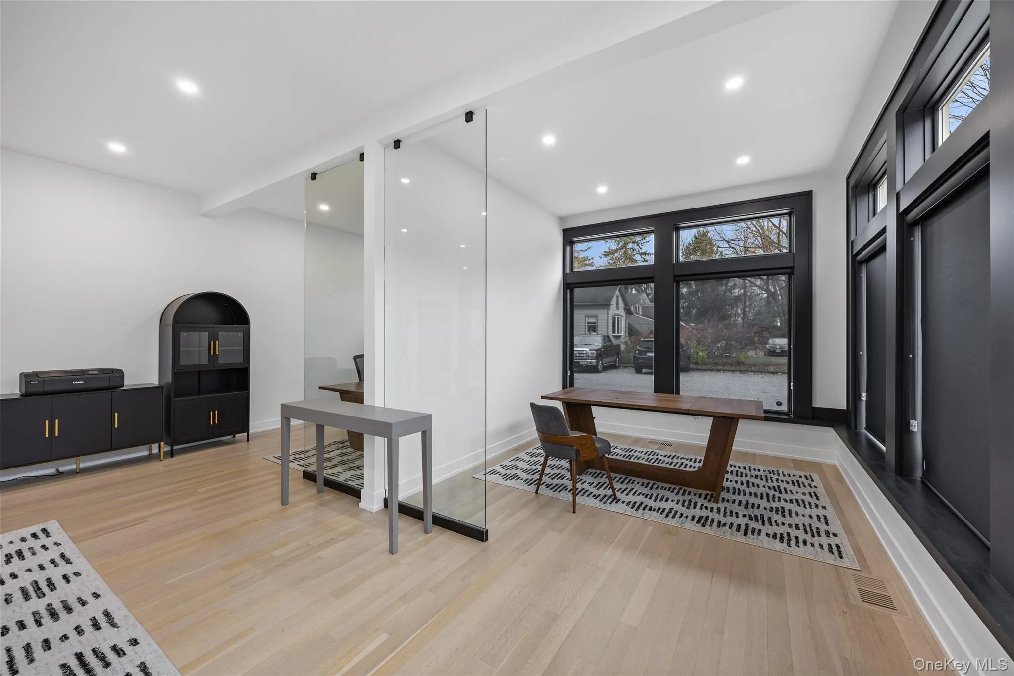 Dining space with recessed lighting and light wood-type flooring Dining space with recessed lighting and light wood-type flooring