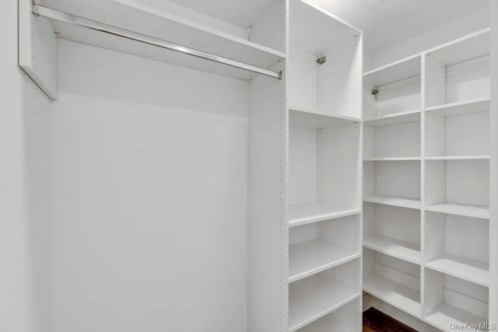 View of walk-in outfitted closet View of walk-in outfitted closet
