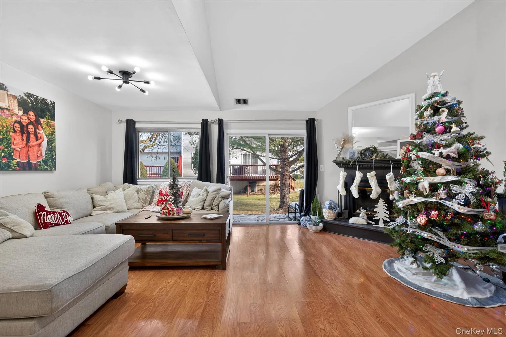 Living area featuring wood finished floors Living area featuring wood finished floors
