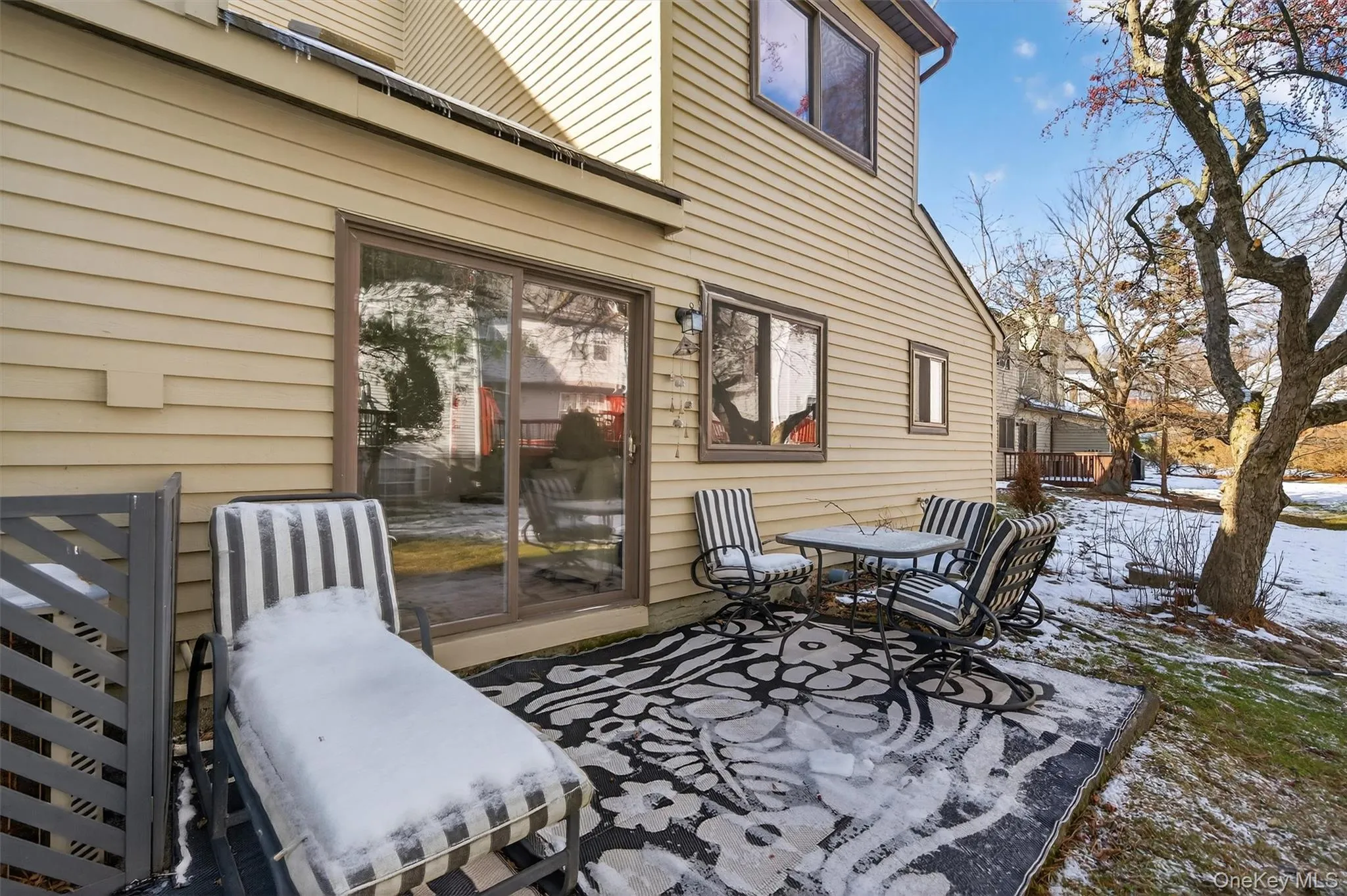 View of patio featuring outdoor dining area View of patio featuring outdoor dining area