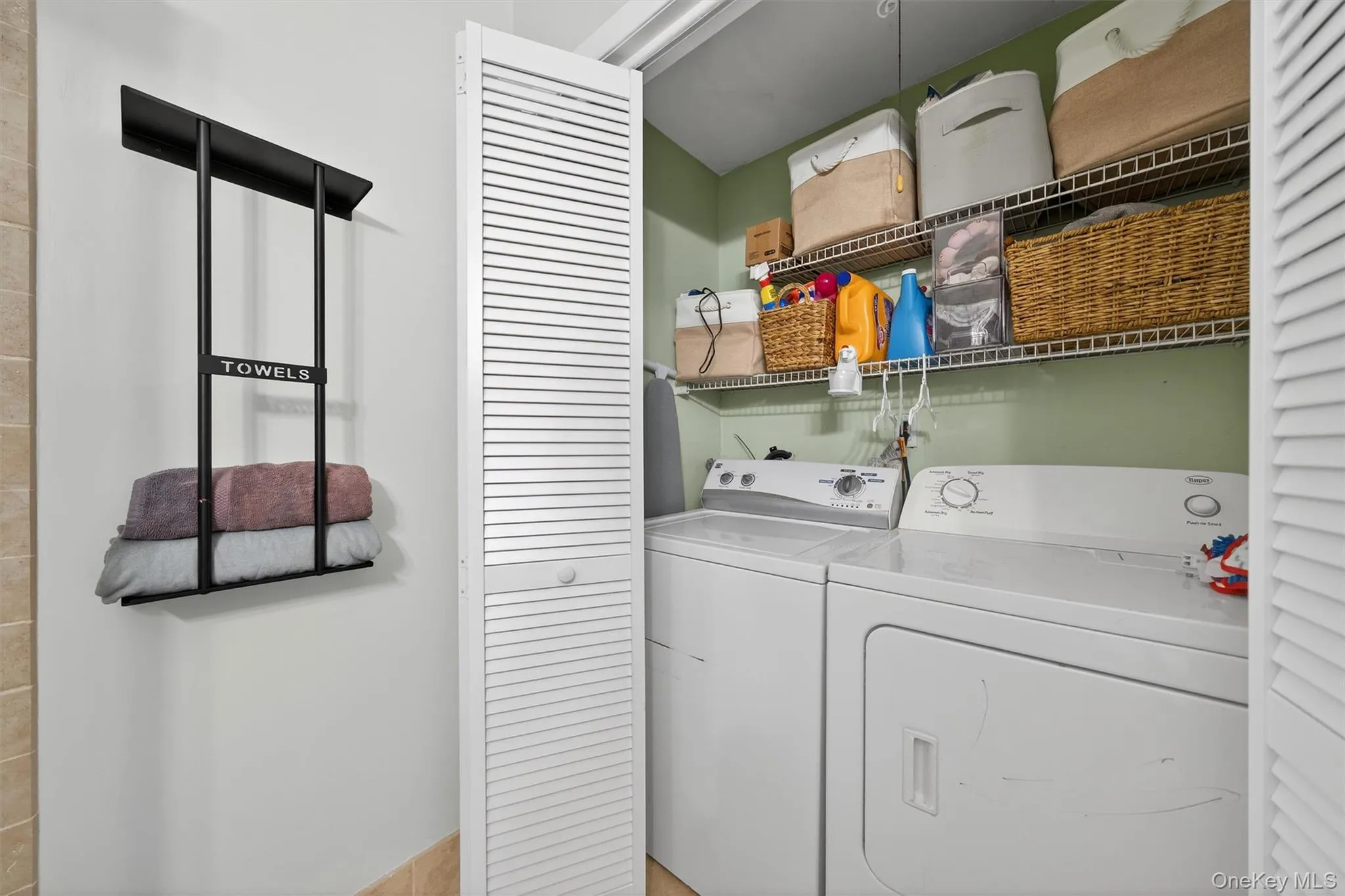 Laundry area with independent washer and dryer Laundry area with independent washer and dryer