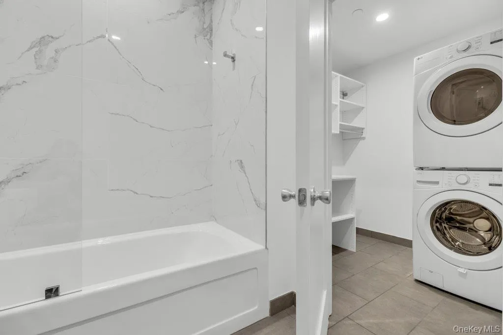 Bathroom with access to laundry room Bathroom with access to laundry room