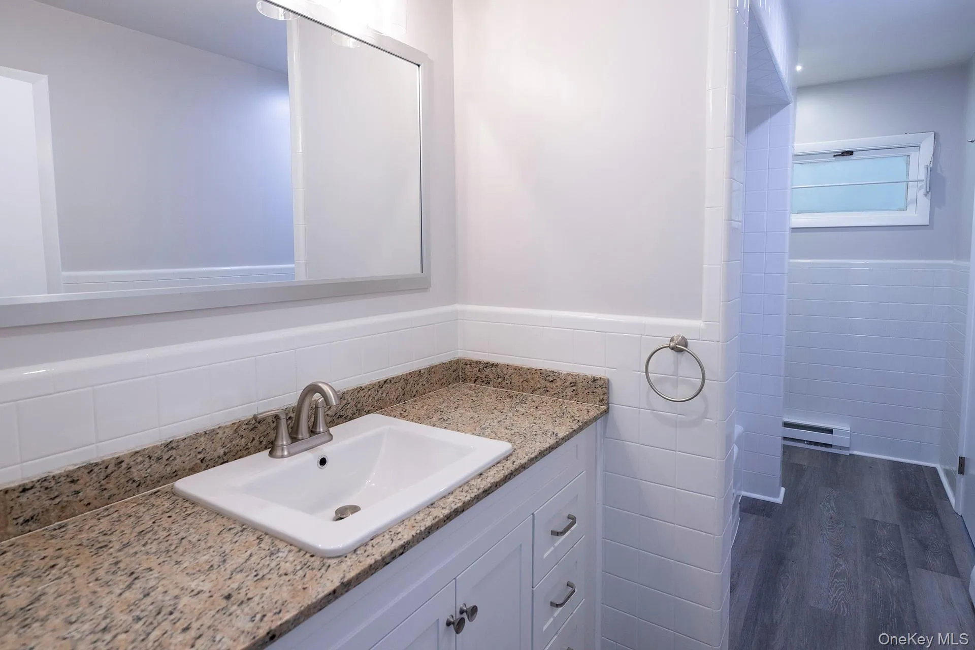 Full bathroom with wainscoting, vanity, Full bathroom with wainscoting, vanity,