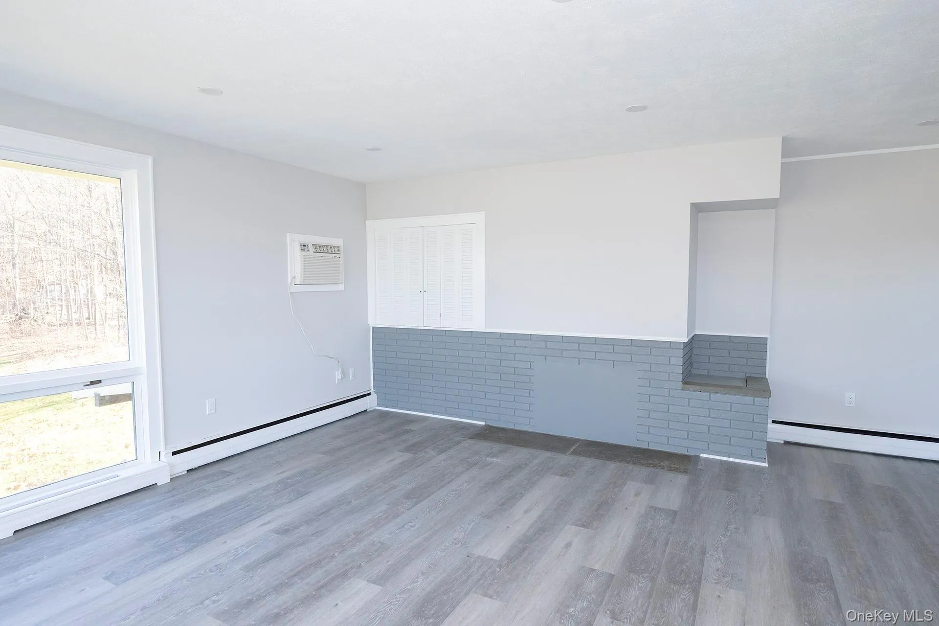 Living room featuring plenty of natural light Living room featuring plenty of natural light