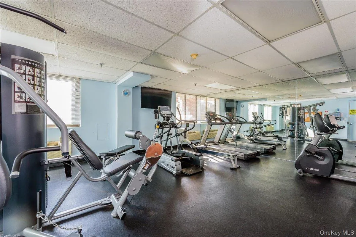 Exercise room featuring a drop ceiling Exercise room featuring a drop ceiling