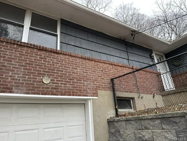 View of home's exterior with a garage View of home's exterior with a garage