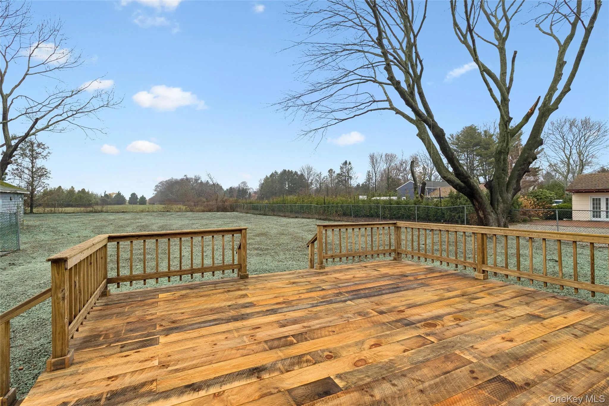 Deck with a fenced backyard Deck with a fenced backyard