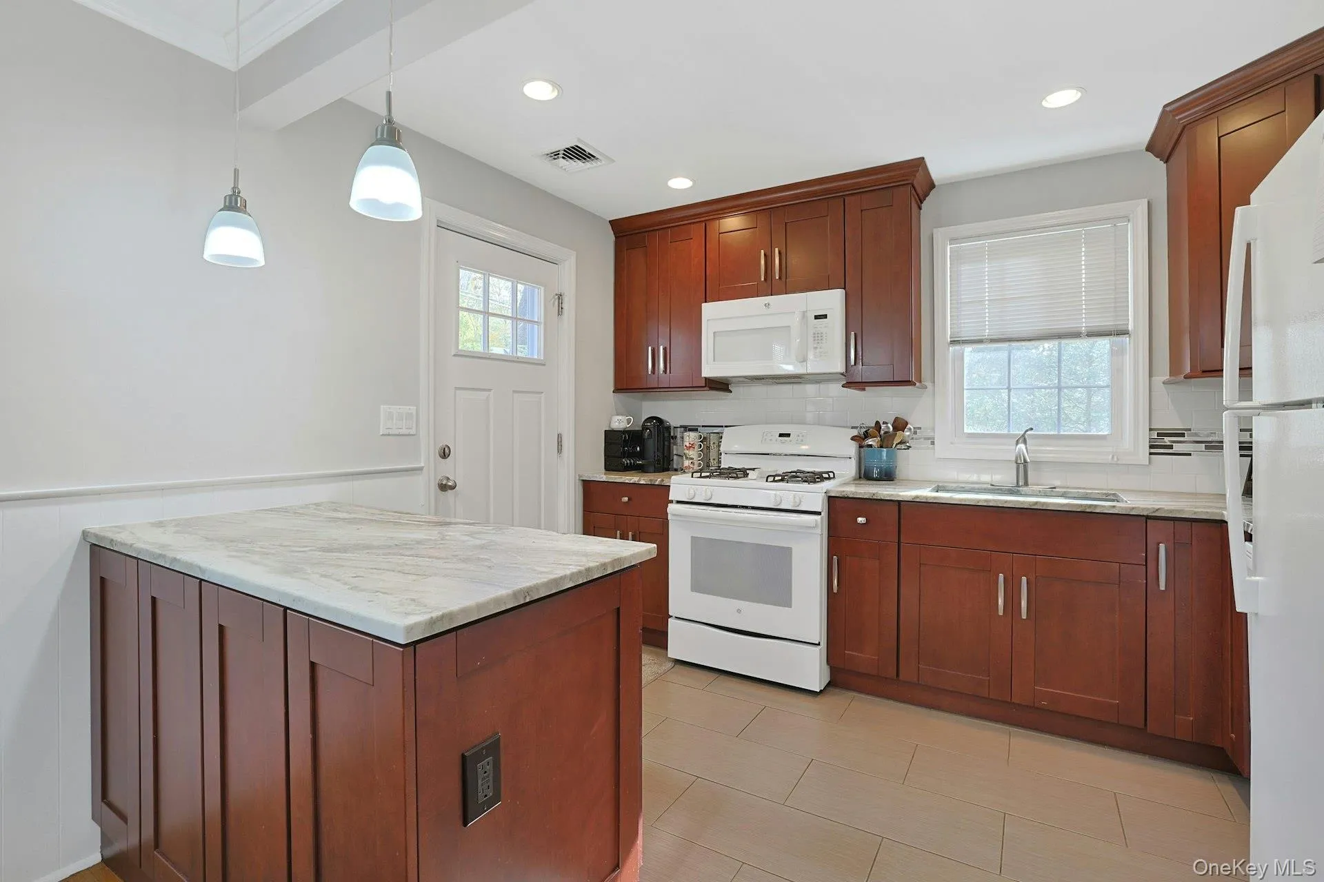 Side door off Kitchen leads to Deck Side door off Kitchen leads to Deck