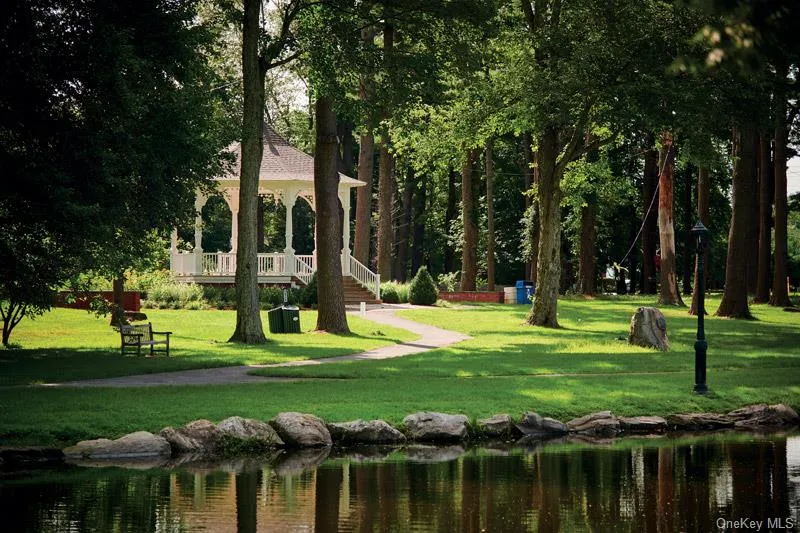 Surrounding community with a lawn and a water view Surrounding community with a lawn and a water view