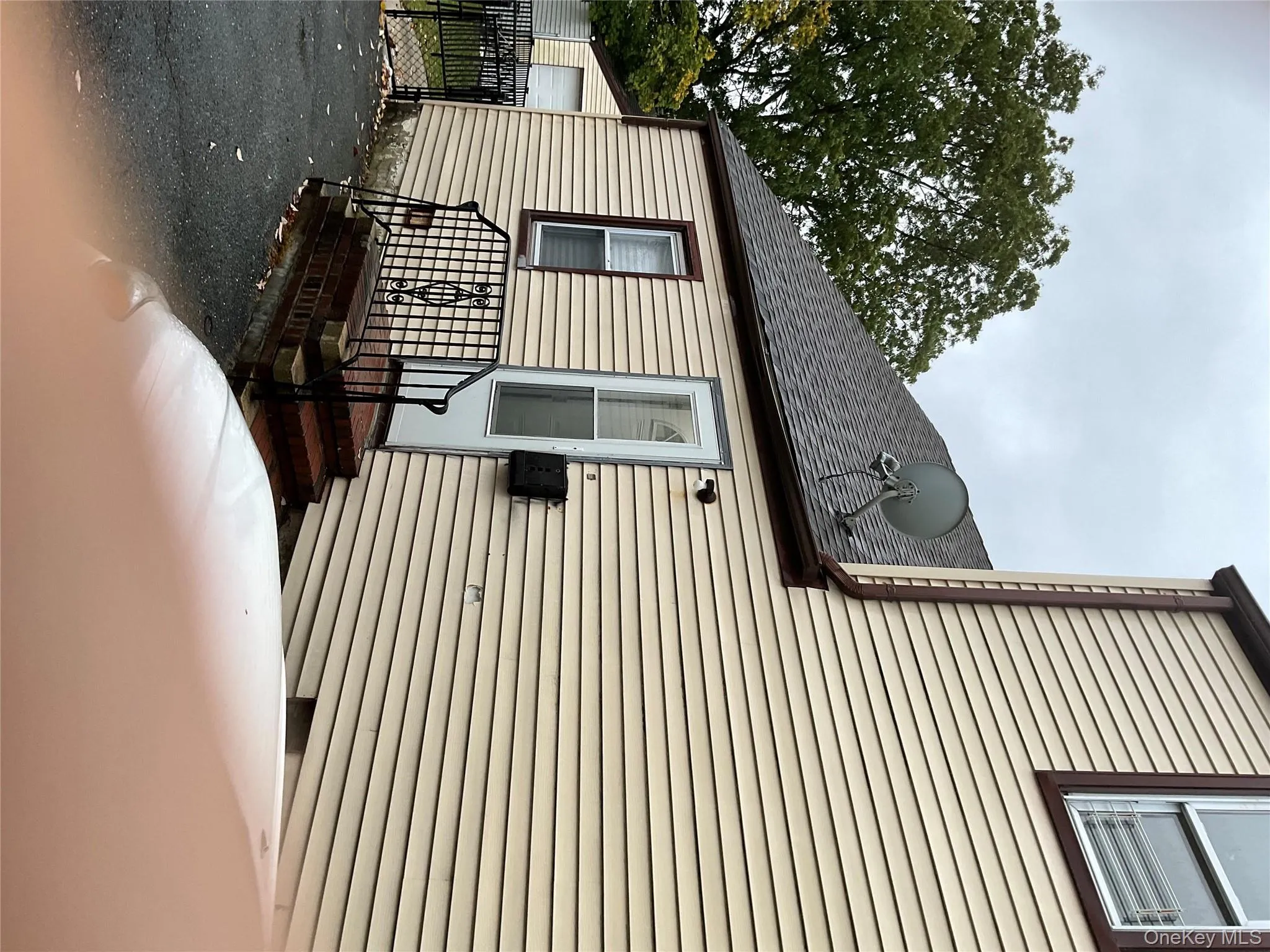 Doorway to property with roof with shingles Doorway to property with roof with shingles