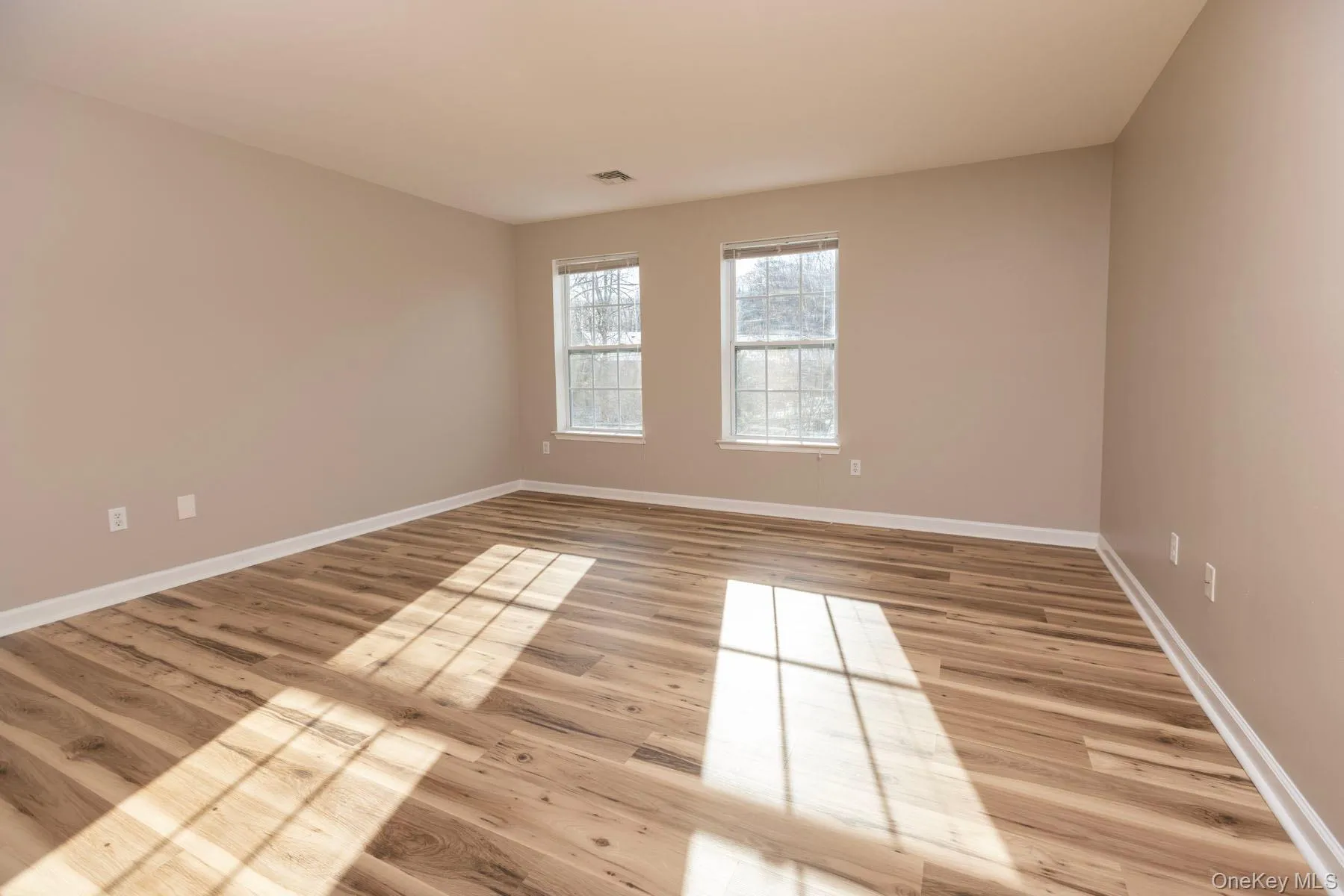 Spare room with light wood-style floors Spare room with light wood-style floors