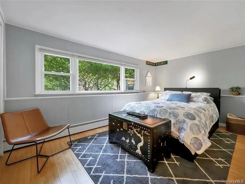 Bedroom with wood-type flooring Bedroom with wood-type flooring