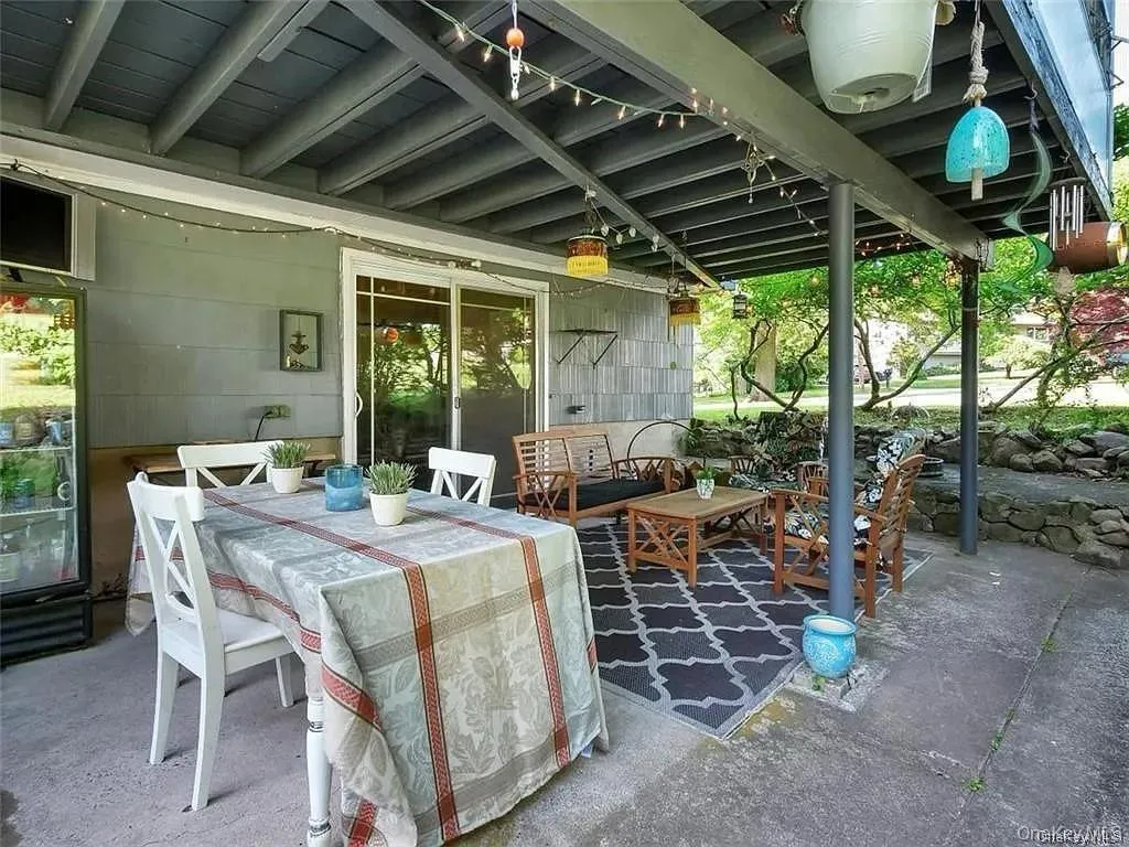 View of patio with an outdoor hangout area View of patio with an outdoor hangout area