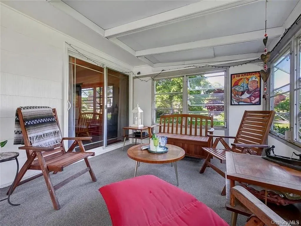 Sunroom / solarium with beamed ceiling Sunroom / solarium with beamed ceiling