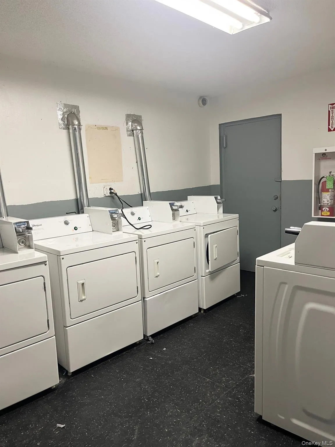 The laundry room is right next door and is nicely kept. The laundry room is right next door and is nicely kept.