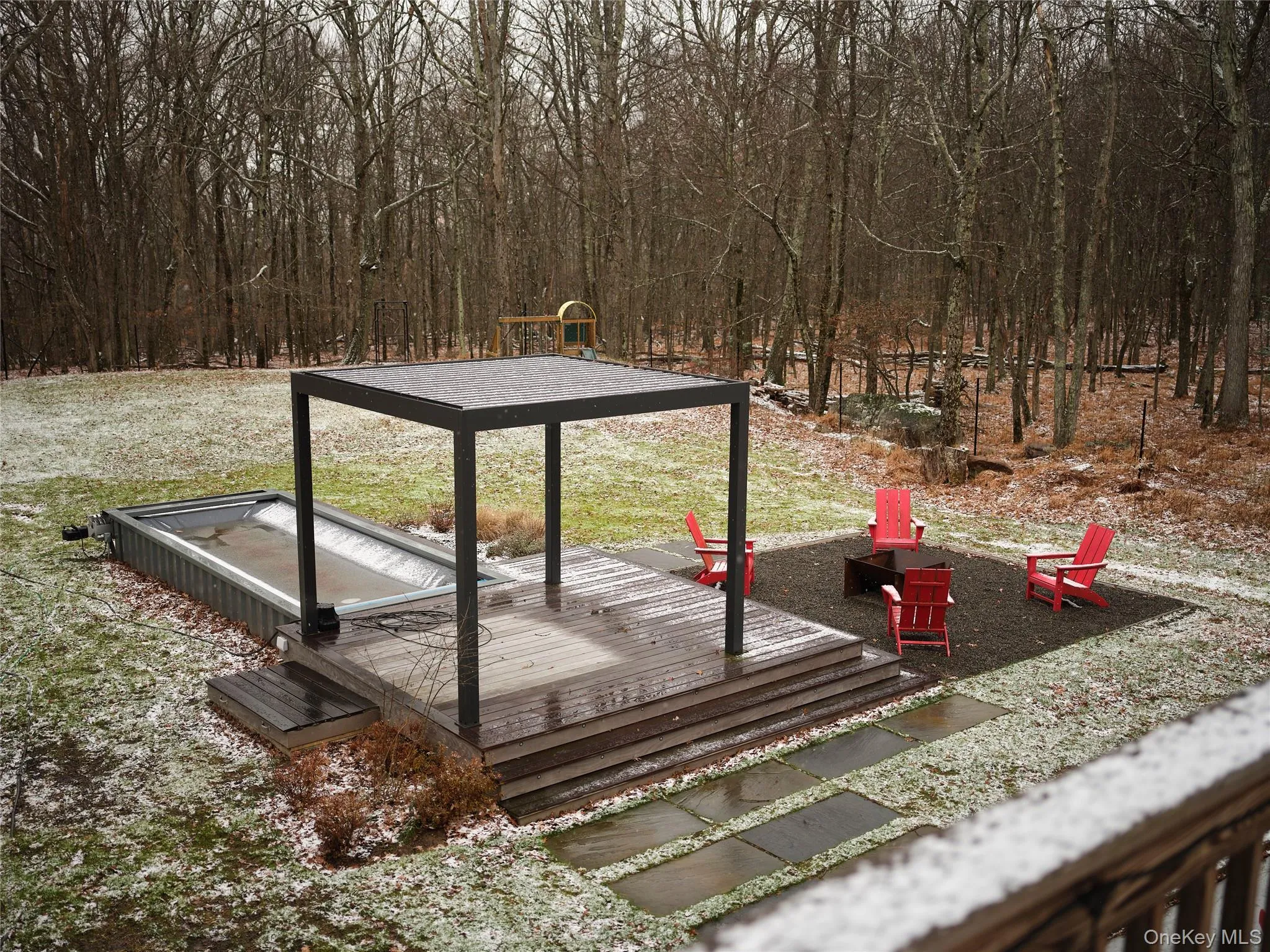 Wooden terrace with a fire pit Wooden terrace with a fire pit