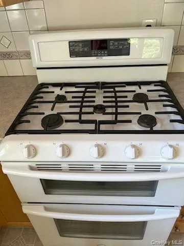 Kitchen view of range with two ovens Kitchen view of range with two ovens