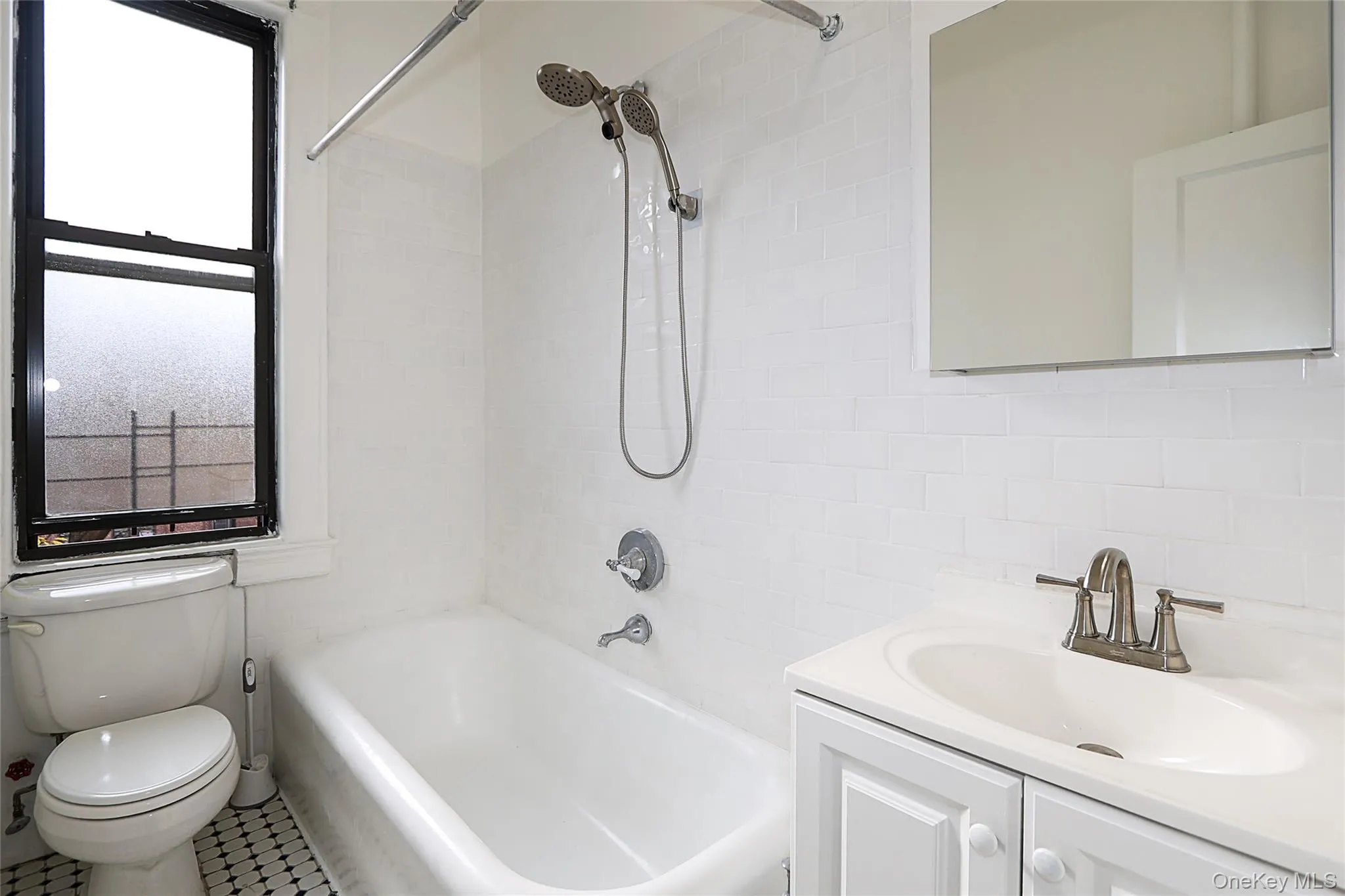 Bathroom with vanity and tub / shower combination Bathroom with vanity and tub / shower combination