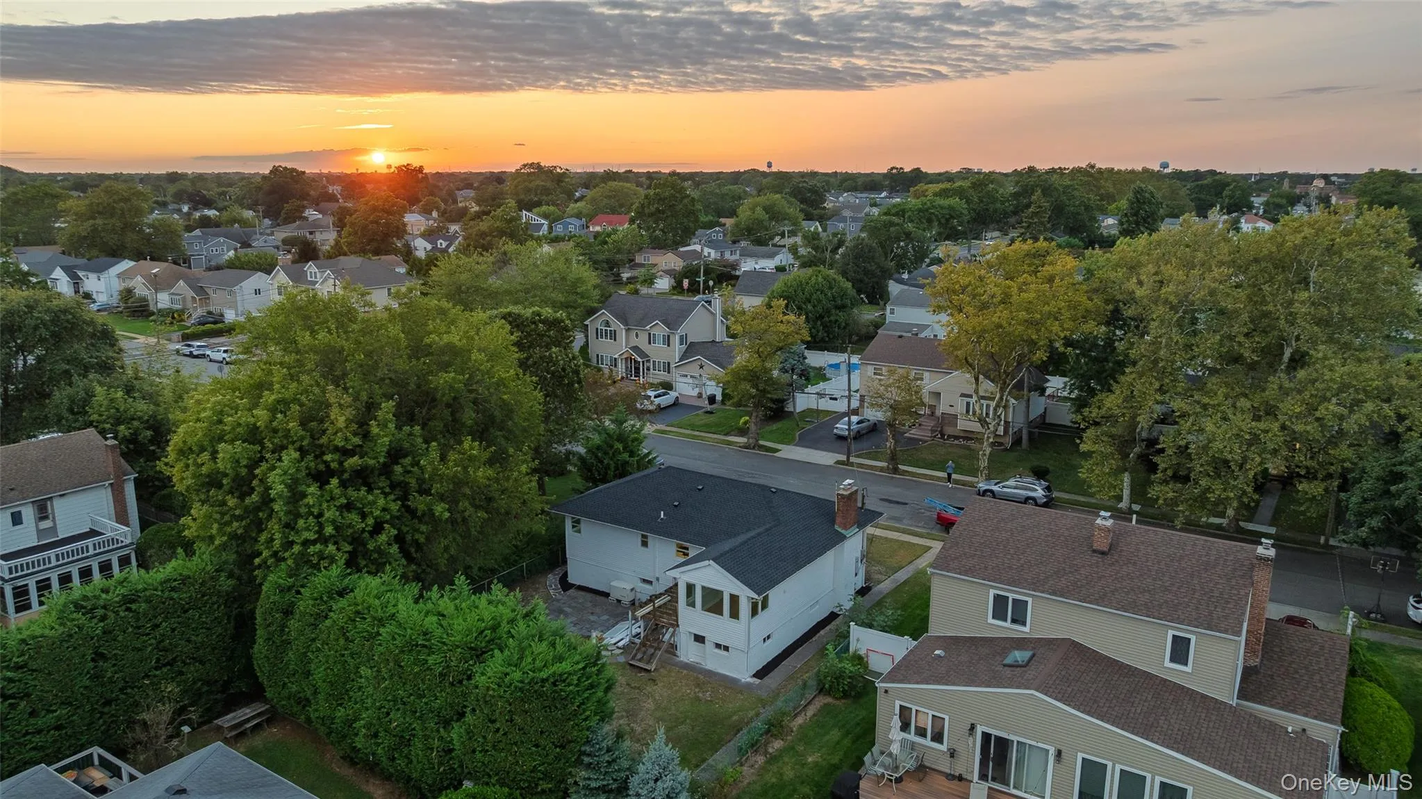 Aerial view at dusk of a residential view Aerial view at dusk of a residential view