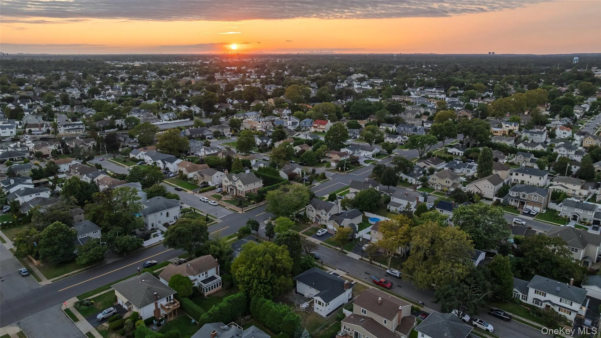 Aerial view at dusk of a residential view Aerial view at dusk of a residential view