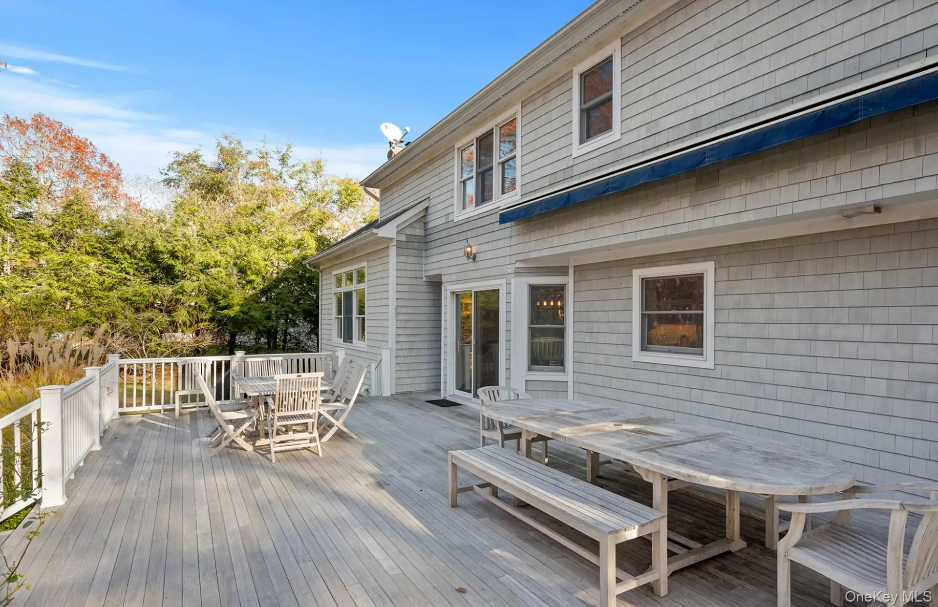 Wooden deck with outdoor dining space Wooden deck with outdoor dining space