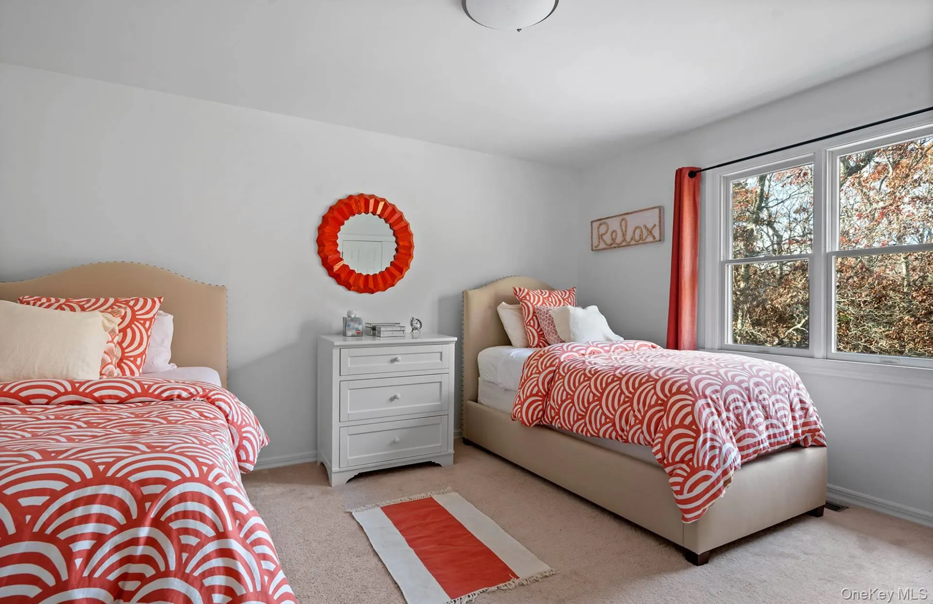 Bedroom featuring carpet floors and baseboards Bedroom featuring carpet floors and baseboards