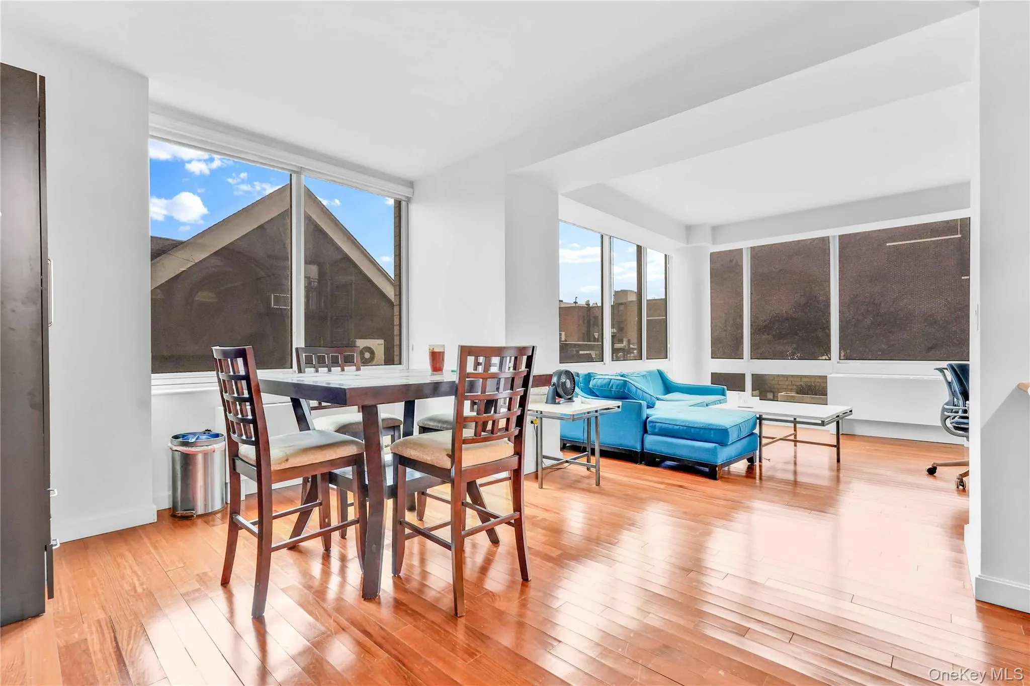 Dining space with light wood finished floors Dining space with light wood finished floors