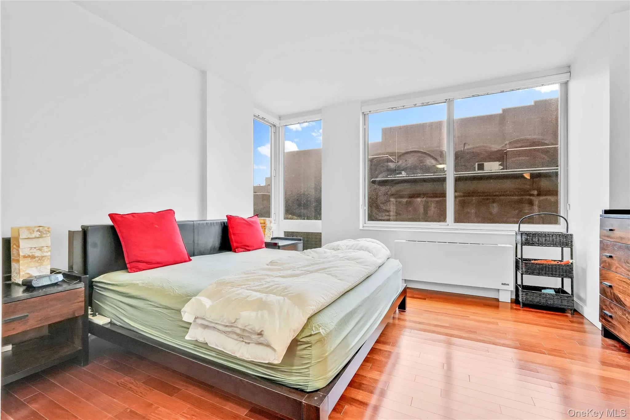 Bedroom with hardwood / wood-style flooring Bedroom with hardwood / wood-style flooring