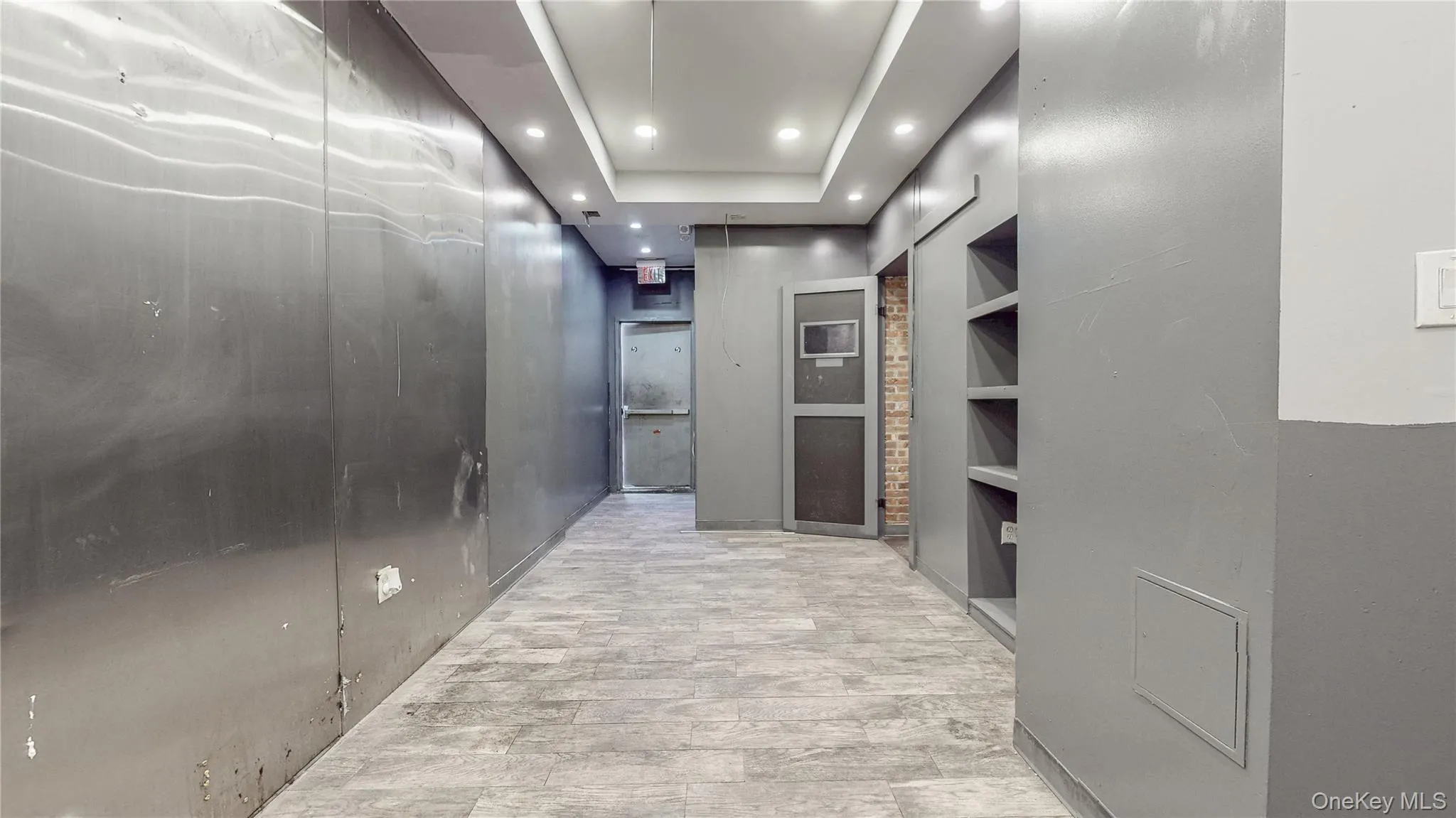 Hallway featuring recessed lighting Hallway featuring recessed lighting