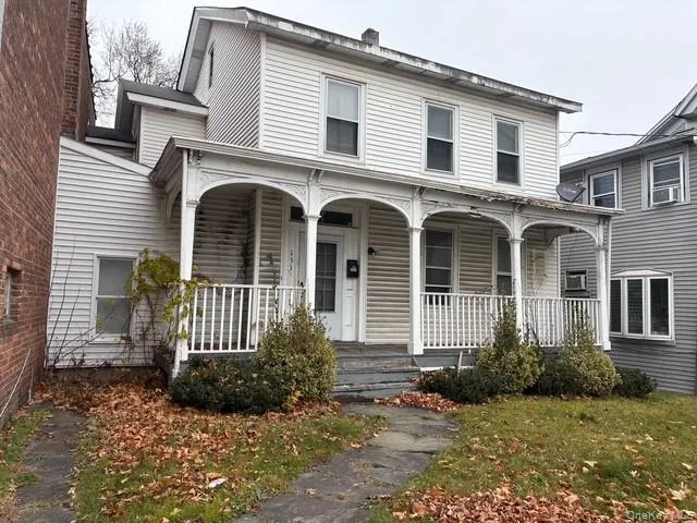 View of front facade featuring a porch View of front facade featuring a porch