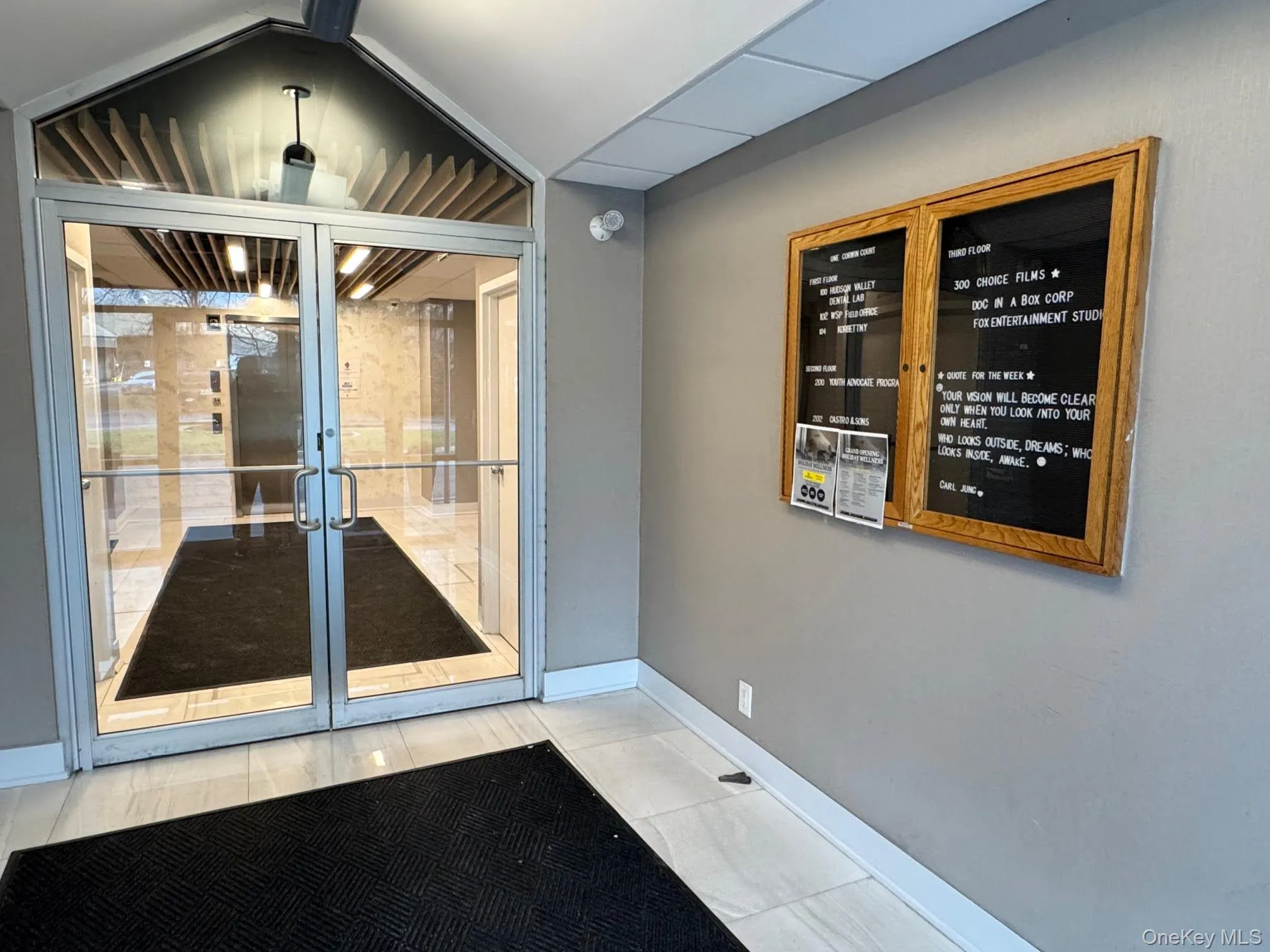 Doorway to property featuring french doors Doorway to property featuring french doors