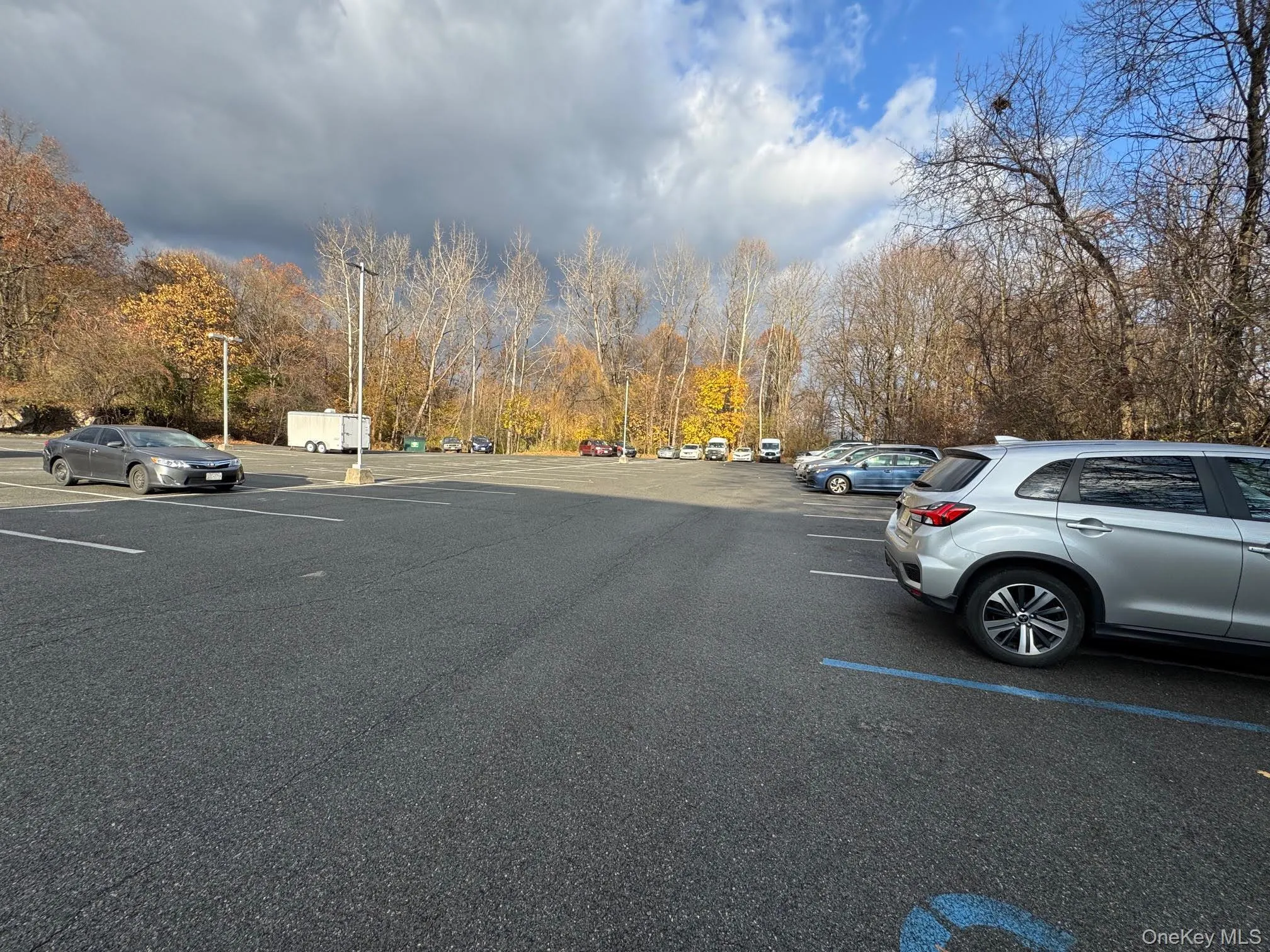 View of uncovered parking lot View of uncovered parking lot