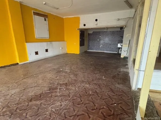 Unfurnished living room with a garage Unfurnished living room with a garage