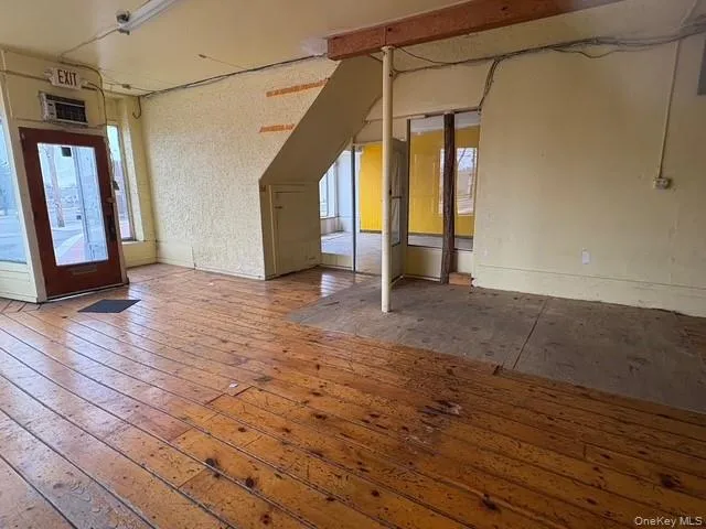 Entrance foyer with wood-type flooring Entrance foyer with wood-type flooring