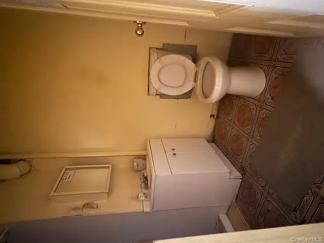 Half bathroom with vanity and toilet Half bathroom with vanity and toilet