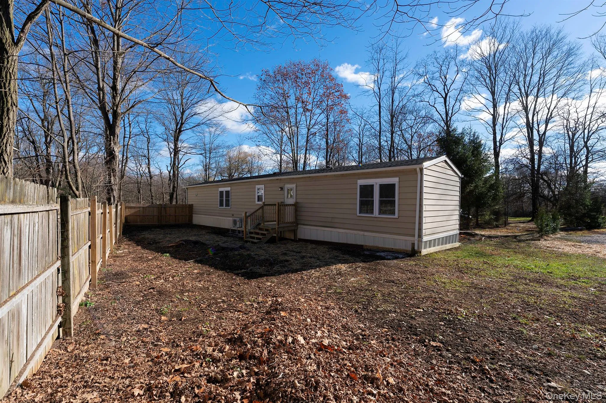 Back of house featuring a fenced backyard Back of house featuring a fenced backyard
