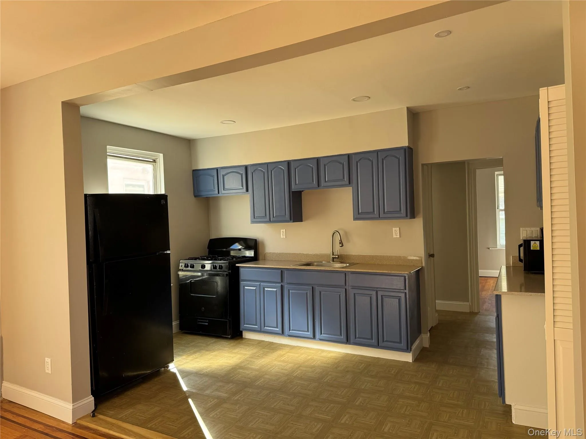 Kitchen featuring black appliances and recessed lighting Kitchen featuring black appliances and recessed lighting