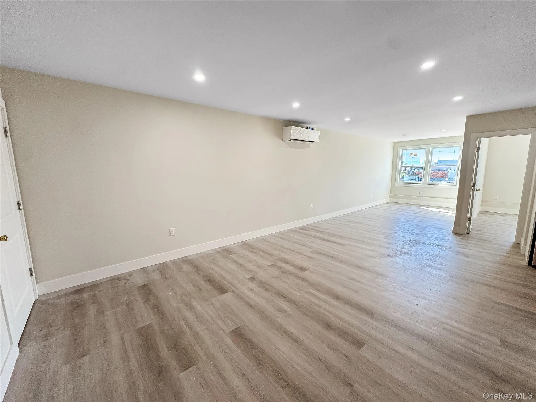 Below grade area featuring light wood-style floors and recessed lighting Below grade area featuring light wood-style floors and recessed lighting