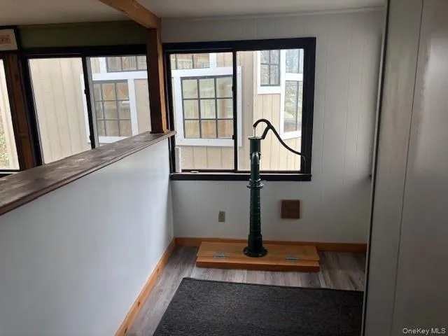 Detailed view of wood finished floors and baseboards Detailed view of wood finished floors and baseboards